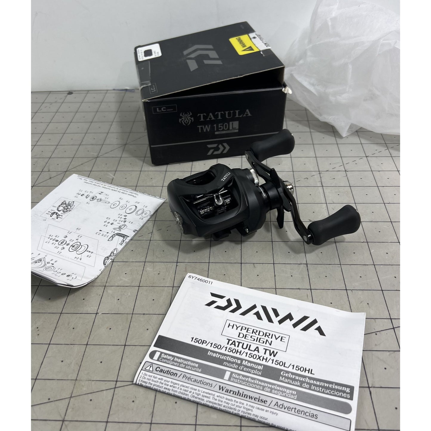 Daiwa Tatula TW 150L Left-Hand Baitcasting Reel Black With Box & Manual